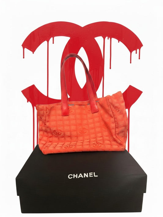 Noticed Atelier by Legzdiamond vintage Chanel coral orange CC jacquard canvas tote bag with red leather handles