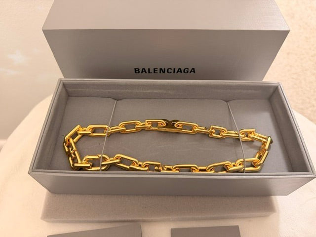 Noticed Atelier by Legzdiamond authentic Balenciaga gold chain choker in its original branded presentation box.