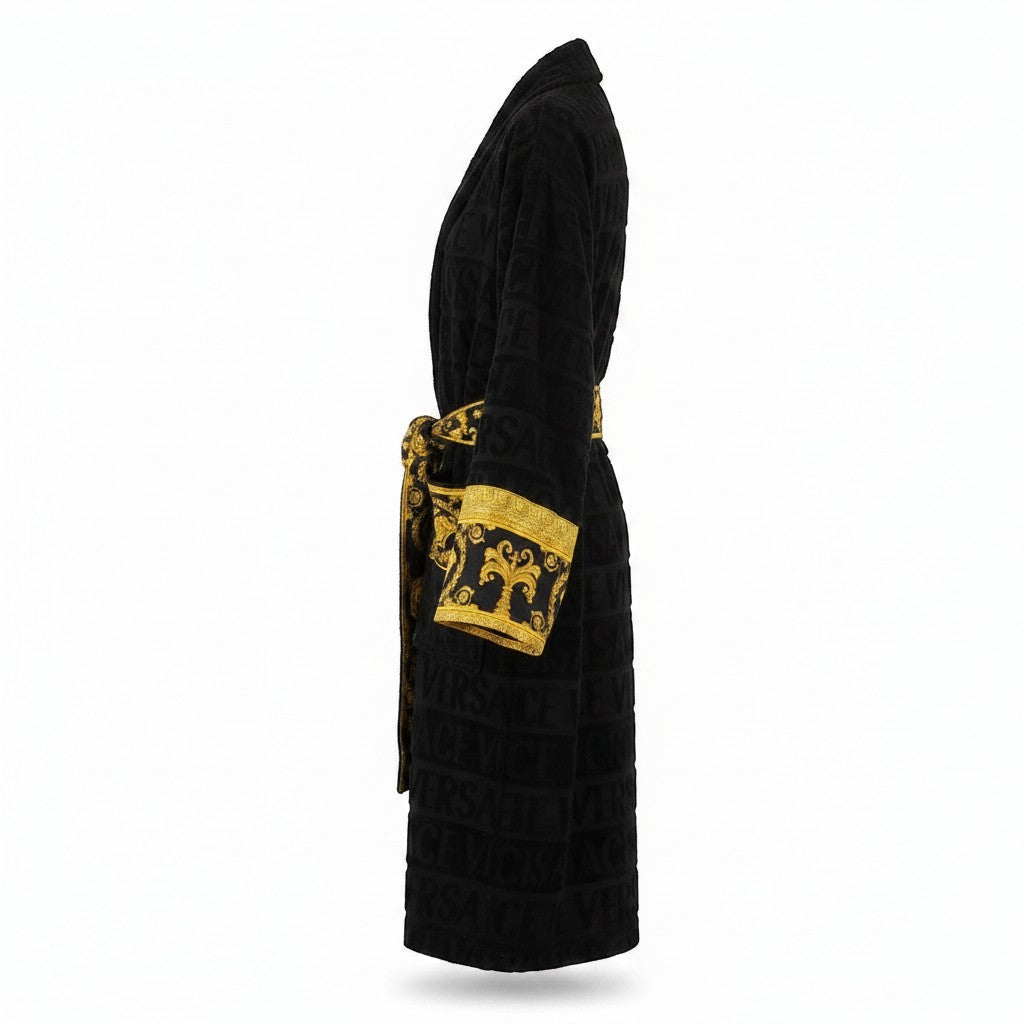 Noticed Atelier by Legzdiamond black plush cotton bathrobe with gold Baroque print cuffs and embossed logo pattern