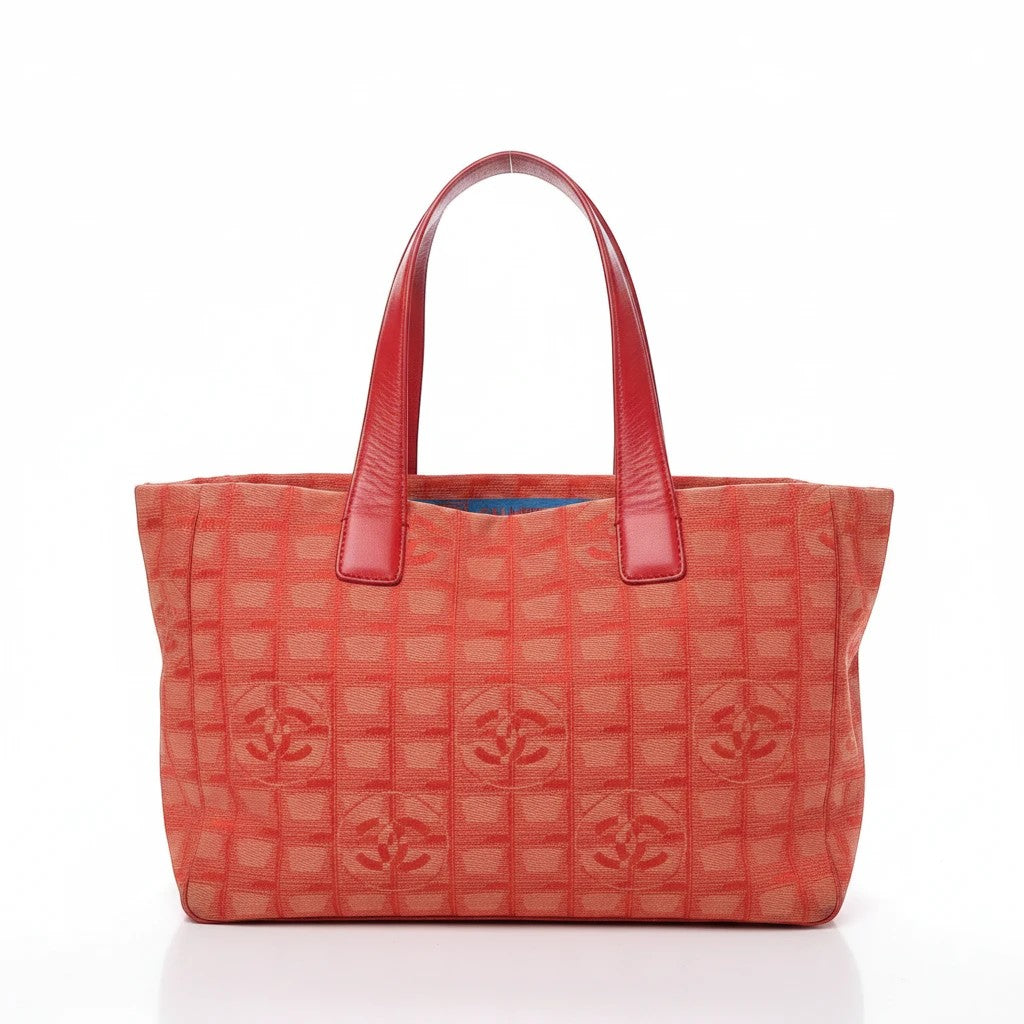 Noticed Atelier by Legzdiamond vintage Chanel CC jacquard tote bag in coral orange canvas with red leather handles