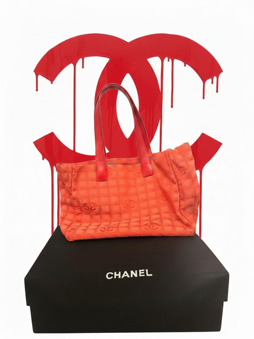 Noticed Atelier by Legzdiamond vintage Chanel coral orange CC jacquard canvas tote bag with red leather handles