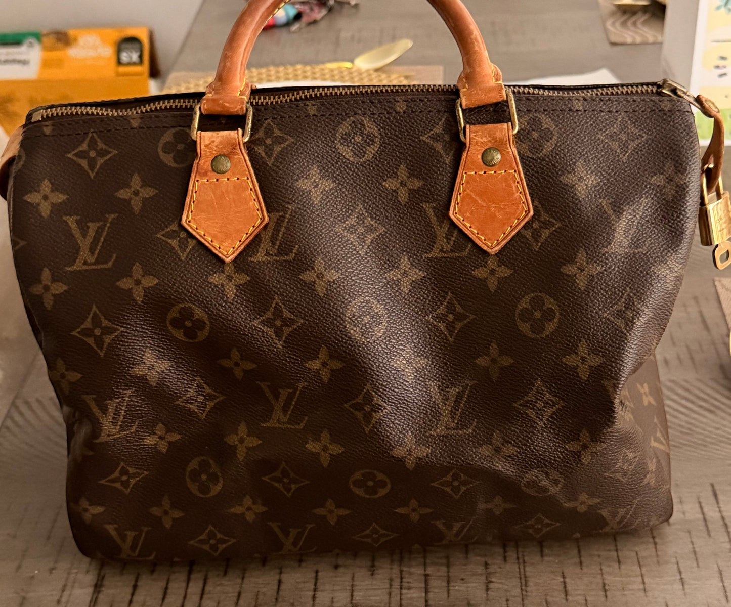 Noticed Atelier by Legzdiamond vintage Louis Vuitton Speedy 30 handbag in iconic brown monogram canvas with leather trim