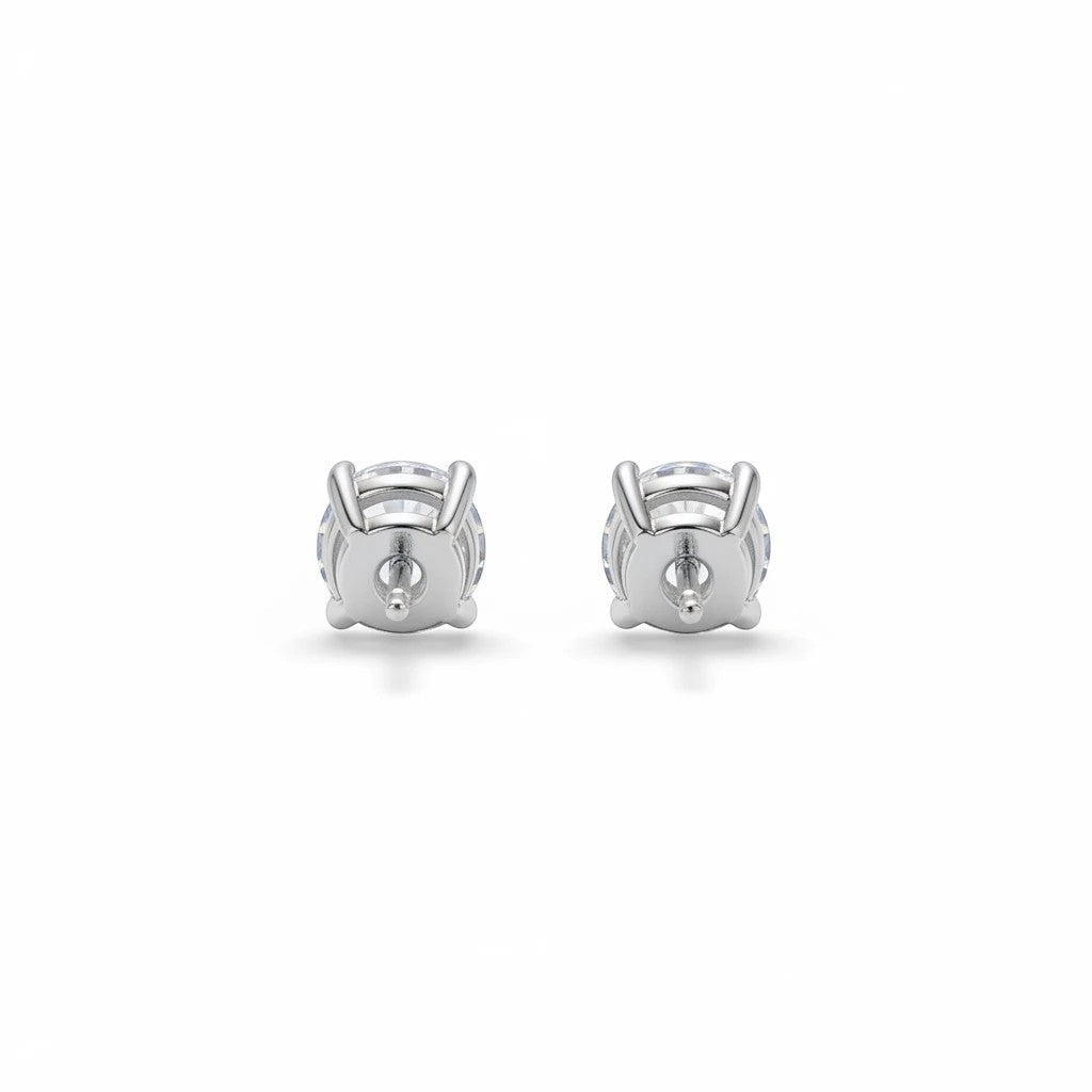 Noticed Atelier by Legzdiamond sterling silver moissanite stud earrings with four-prong settings, back view.