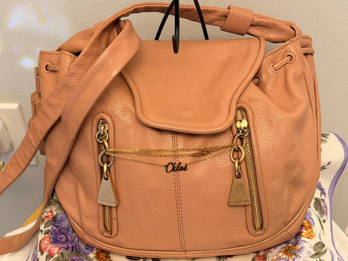 Noticed Atelier by Legzdiamond vintage See by Chloé rose gold leather clutch bag with signature chain detail