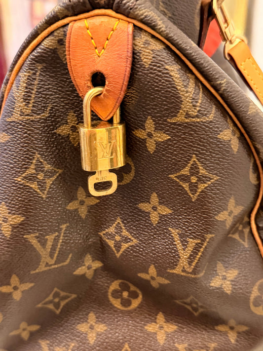 Noticed Atelier by Legzdiamond vintage Louis Vuitton Speedy 30 monogram canvas bag with brass lock and vachetta trim